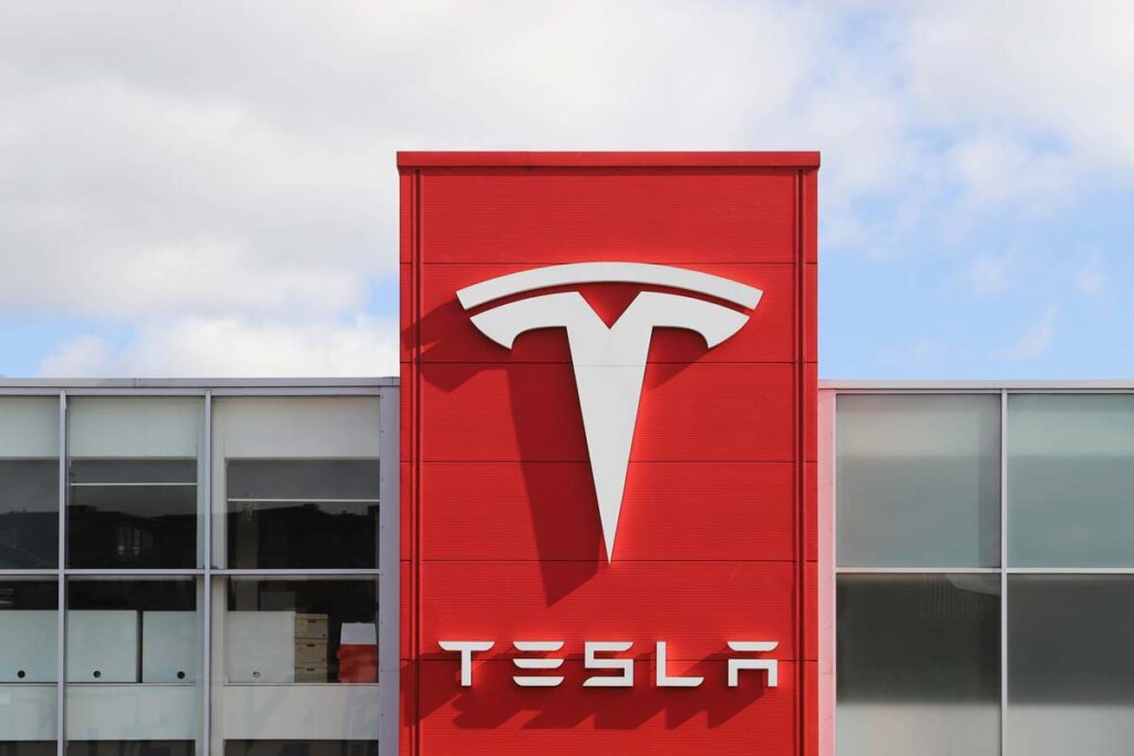Close up of Tesla signage, representing the Tesla Autopilot verdict.