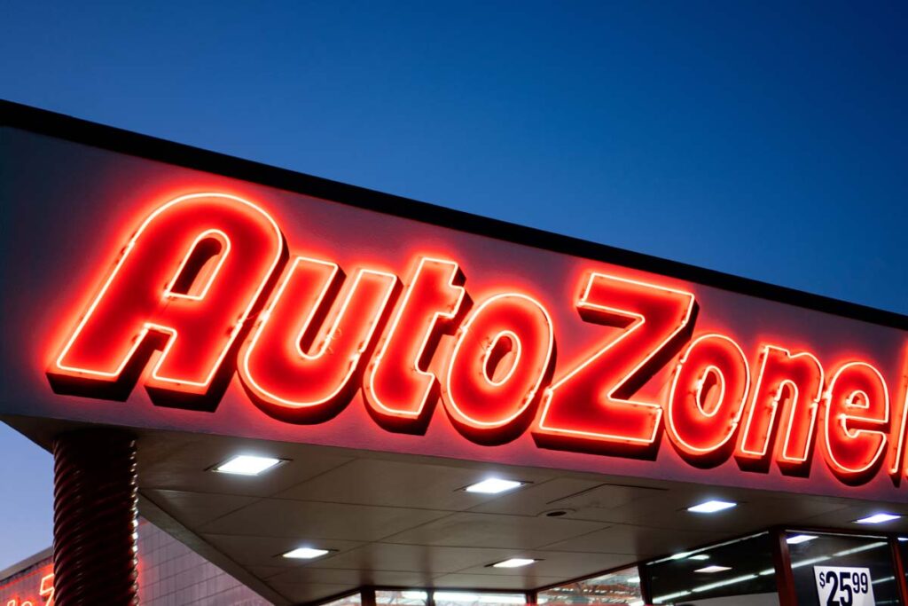 Close up of an illuminated Auto Zone sign, representing the AutoZone data breach class action.