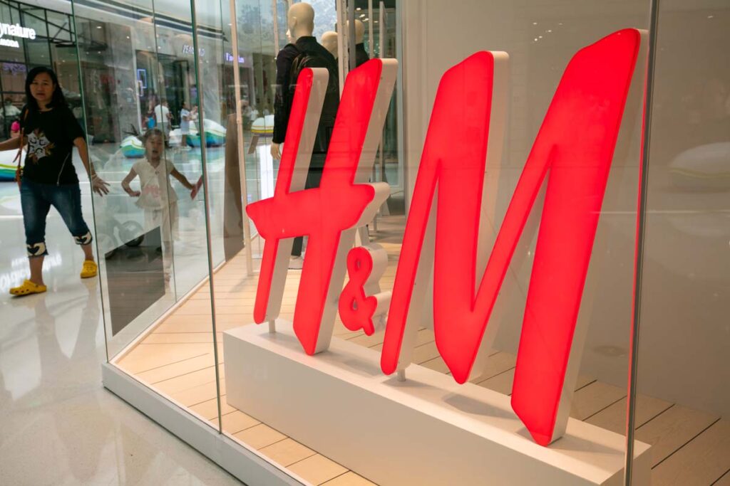 Close up of H&M signage, representing the H&M recycled and organic class action.