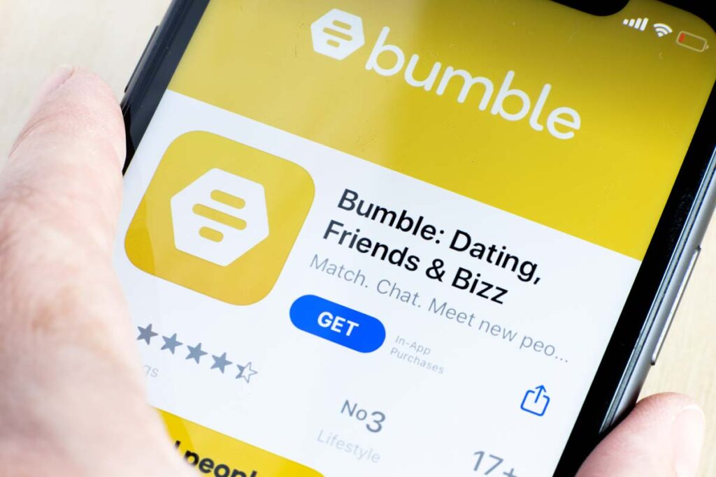 Close up of the Bumble app download page displayed on a smartphone, representing the Bumble biometric data class action.