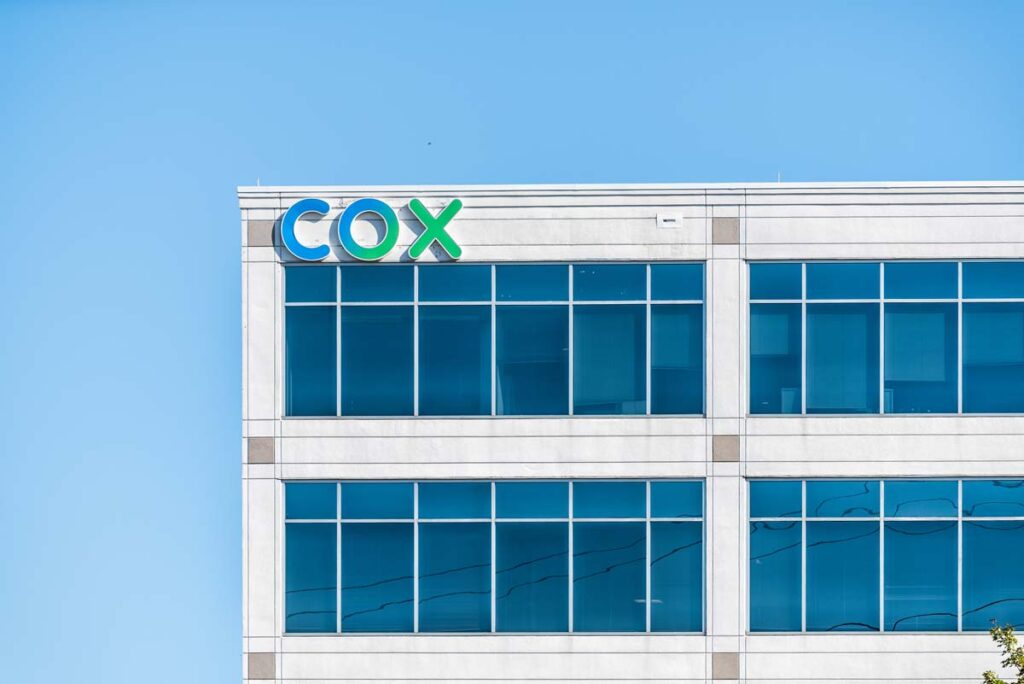 Exterior of a Cox building, representing the Cox discrimination penalties over job advertisements.