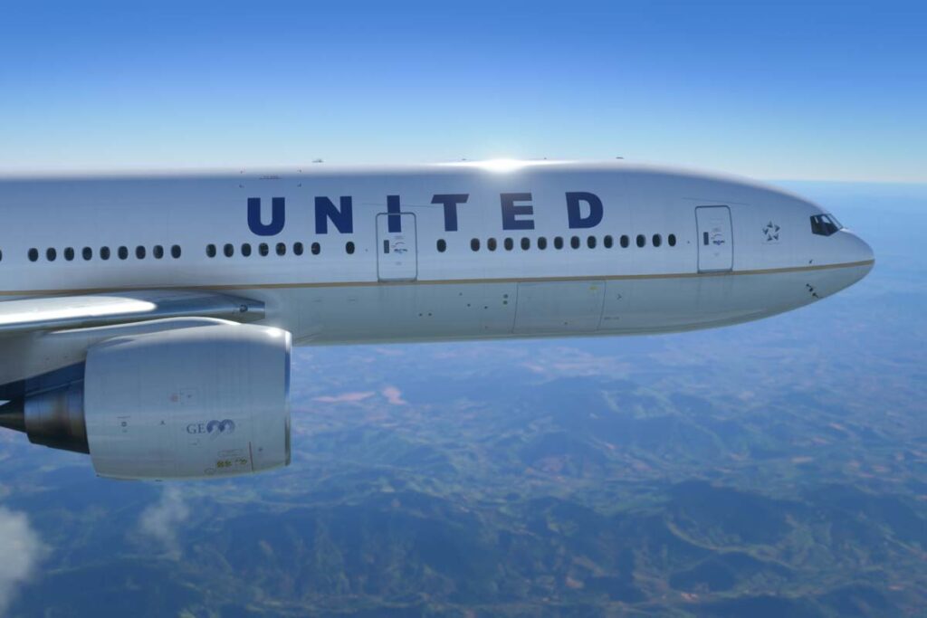 A United Airlines aircraft in flight, representing the United Airlines class action.