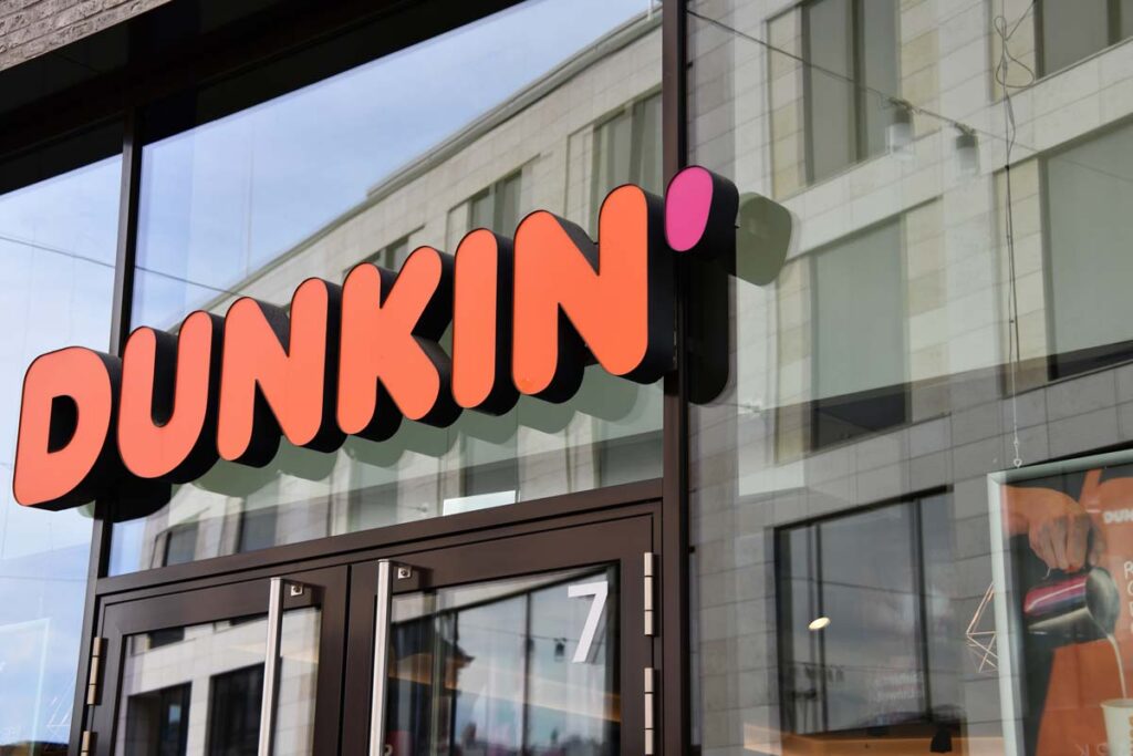 Close up of Dunkin signage, representing the Dunkin' child labor settlement.