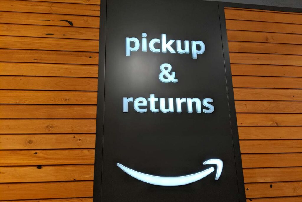 Close up of Amazon pickup & return sign, representing the Amazon return policy class action.