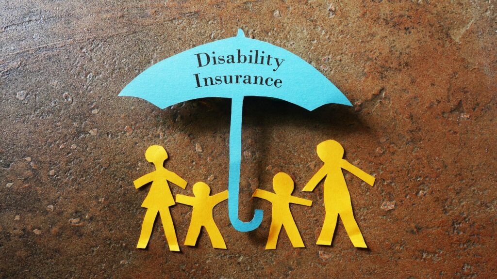Paper family of four under a paper Disability Insurance umbrella