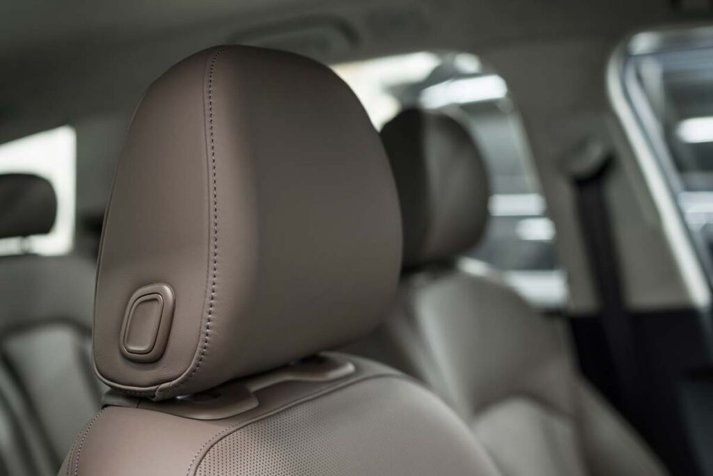 Close up of a car headrest, representing the Fiat Chrysler headrest class action.