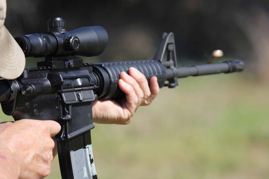Close up of a man firing a gun, representing the Supreme Court hearing a bump stock ban lawsuit.