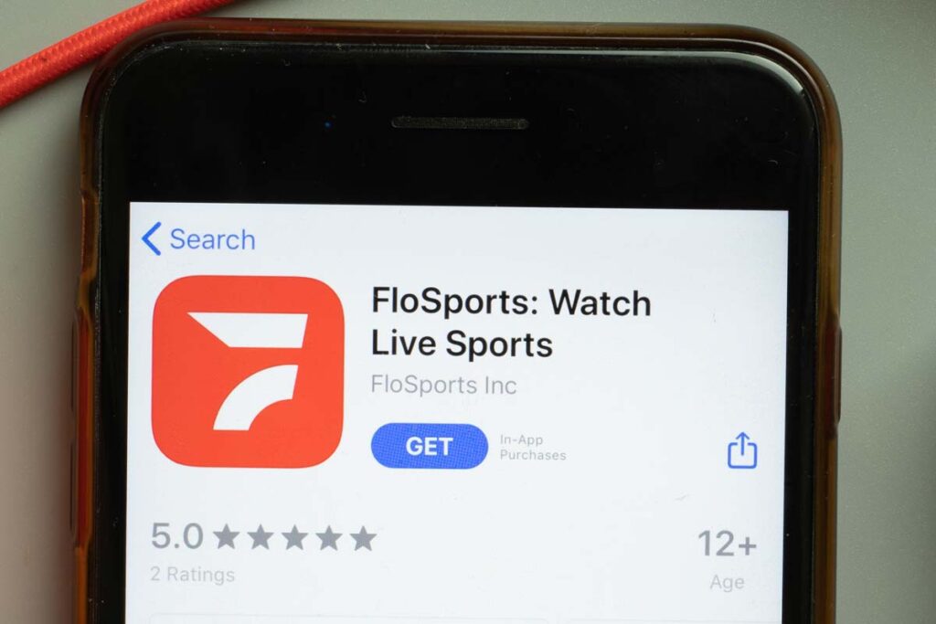 Close up of FloSports app download page displayed on a smartphone screen, representing the FloSports class action lawsuit settlement.