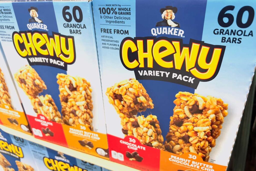 Quaker granola products on a grocery store shelf, representing the Quaker granola recall.