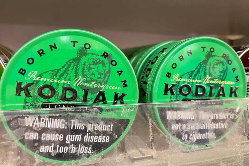 Kodiak snuff products on a shelf, representing the Kodiak tobacco recall.