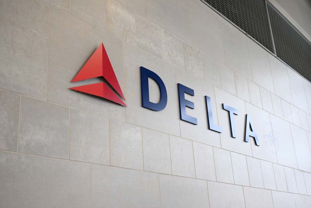 Close up of Delta Airlines signage on a wall, representing the Delta class action.