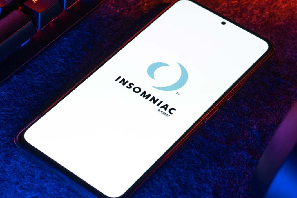 Close up of Insomniac Games logo displayed on a smartphone, representing the Insomniac Games hack.