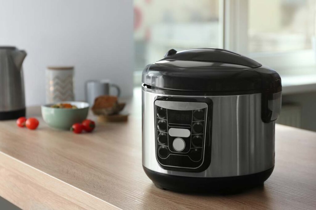 Pressure cooker on a kitchen counter, representing the Best Buy Insignia pressure cookers class action lawsuit.