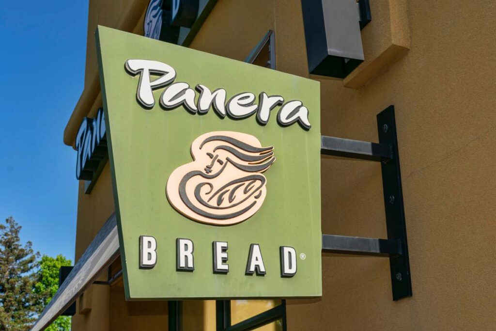 Close up of Panera Bread signage, representing the Panera delivery fees class action lawsuit settlement.