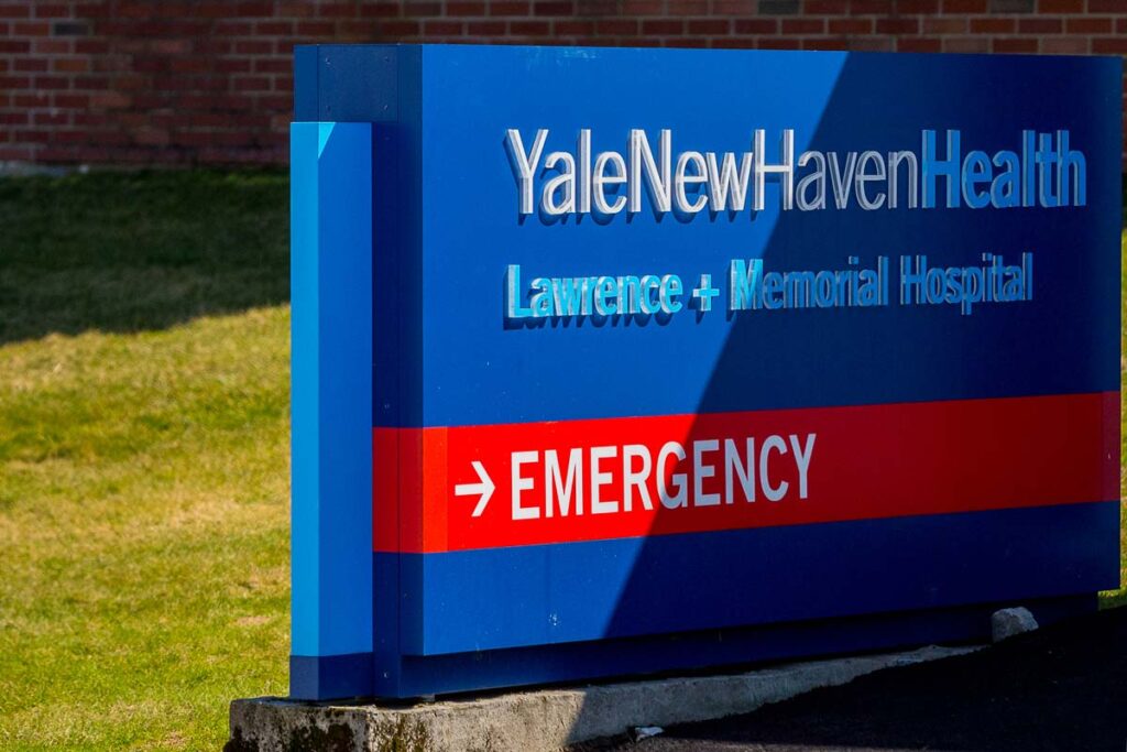 Close up of Yale New Haven signage, representing the Yale New Haven Hospital class action lawsuit settlement.