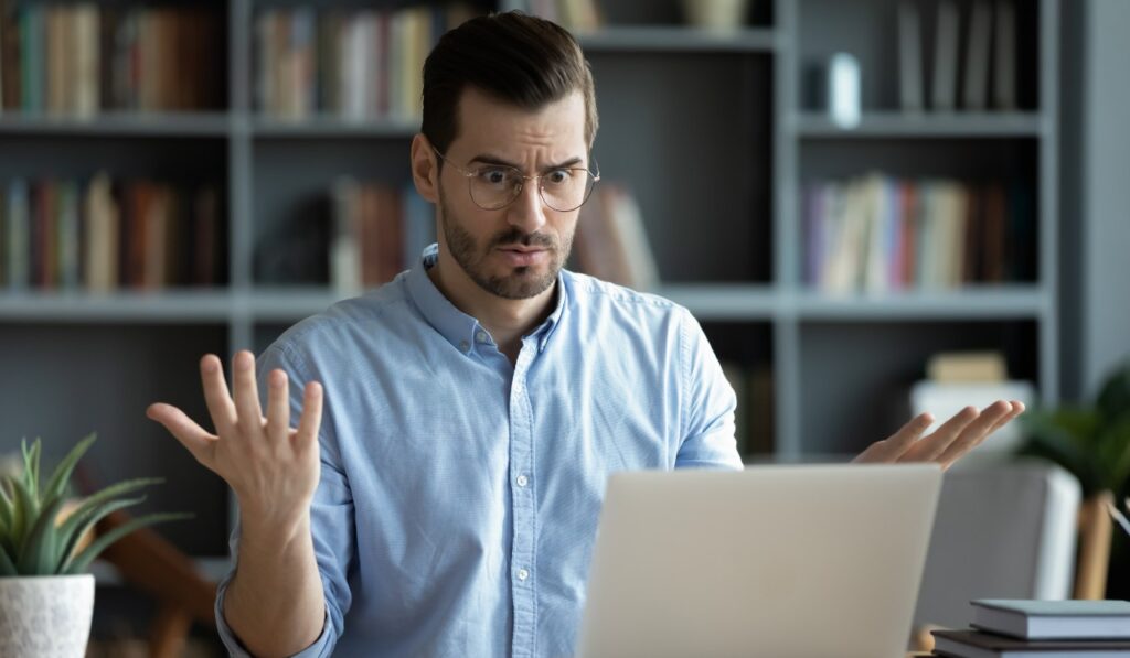 Frustrated man confused surprised by unexpected news of his death.