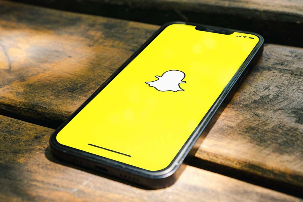 Close up of Snapchat logo displayed on a smartphone screen, representing the Snapchat fentanyl death lawsuit.