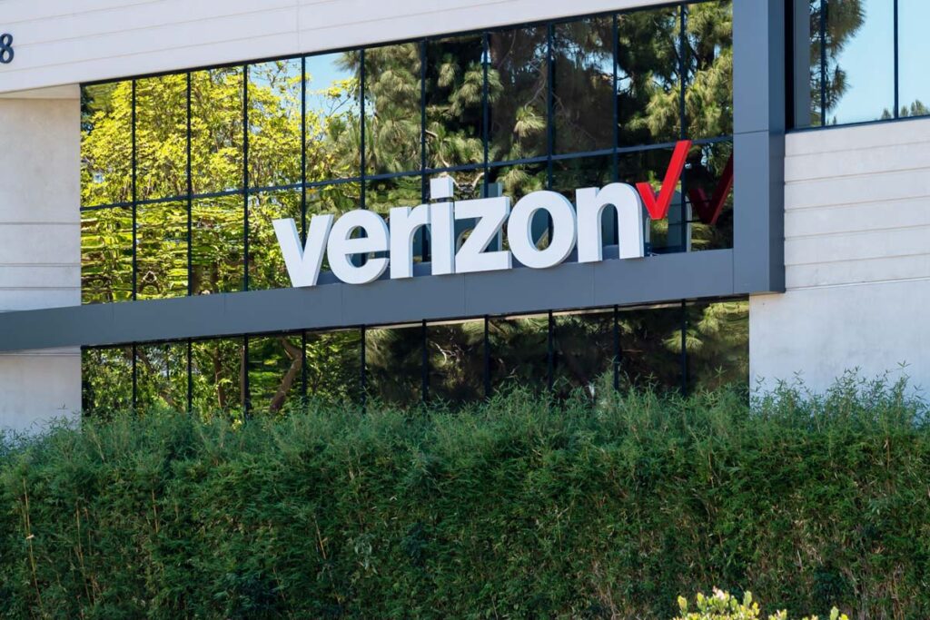 Verizon signage on a building, representing the Verizon and Cellco Partnership administrative fees class action settlement.
