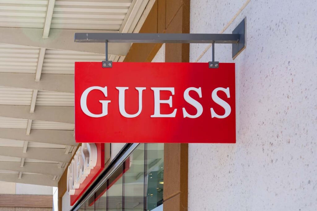 Close up of Guess signage, representing the Guess and Macy's lawsuit.