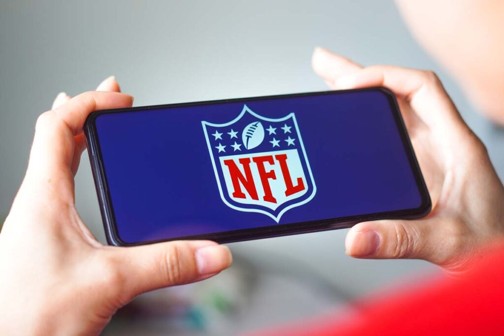 NFL logo displayed on a smartphone screen, representing the NFL Sunday Ticket litigation.