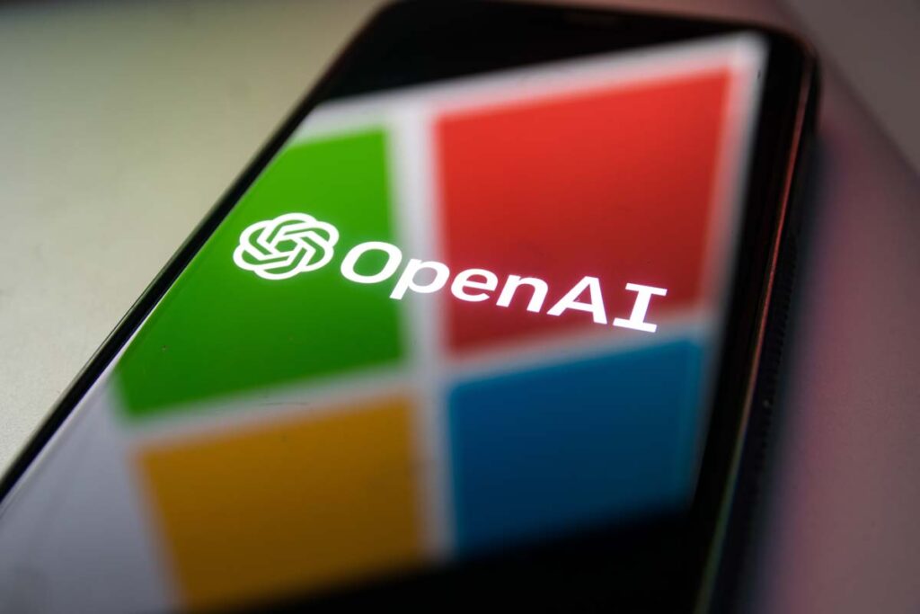 Close up of OpenAI logo displayed on a smartphone screen with Microsoft logo reflection, representing the Microsoft OpenAI copyright lawsuit.