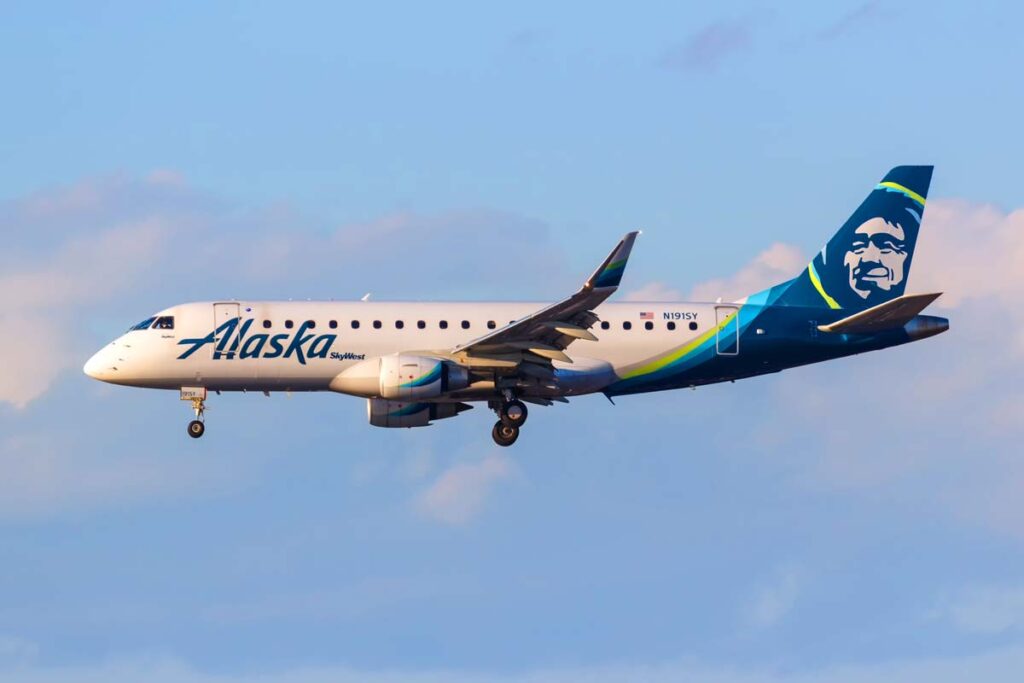 An Alaska Airlines aircraft in flight, representing the Alaska Airlines class action.