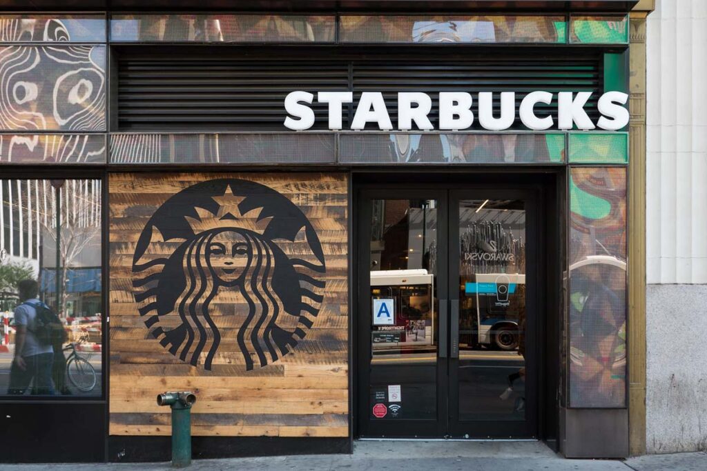 The exterior of a Starbucks location is seen, representing the Starbucks ethically sourced products lawsuit.