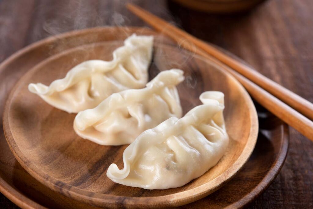Close up of dumplings on a plate, representing the dumplings health alert.