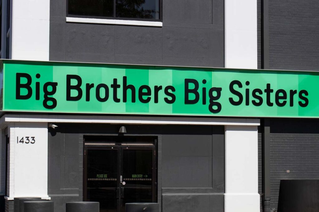 Close up of Big Brothers Big Sisters signage, representing the Big Brothers Big Sisters class action.