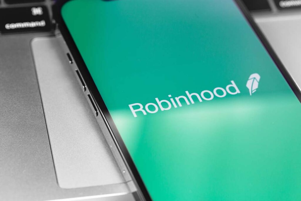 Close up of Robinhood logo displayed on a smartphone screen, representing the Robinhood spam text class action lawsuit settlement.