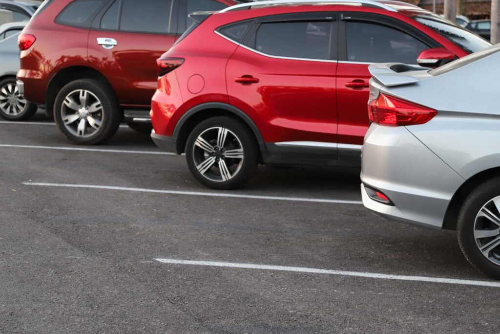 Cars in a parking lot, representing vehicles recalled in January.