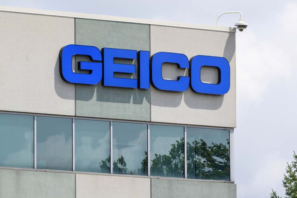 Geico signage on a building, representing the Geico Georgia auto loss taxes class action settlement.