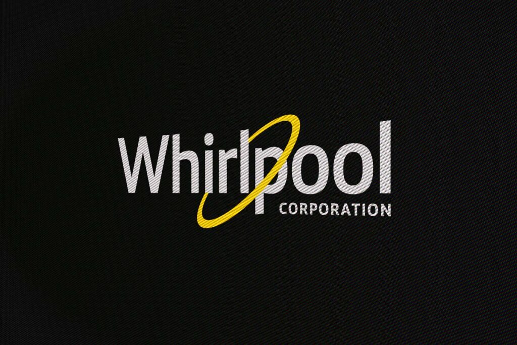 Close up of Whirlpool logo, representing the defective wires in Whirlpool refrigerators class action.