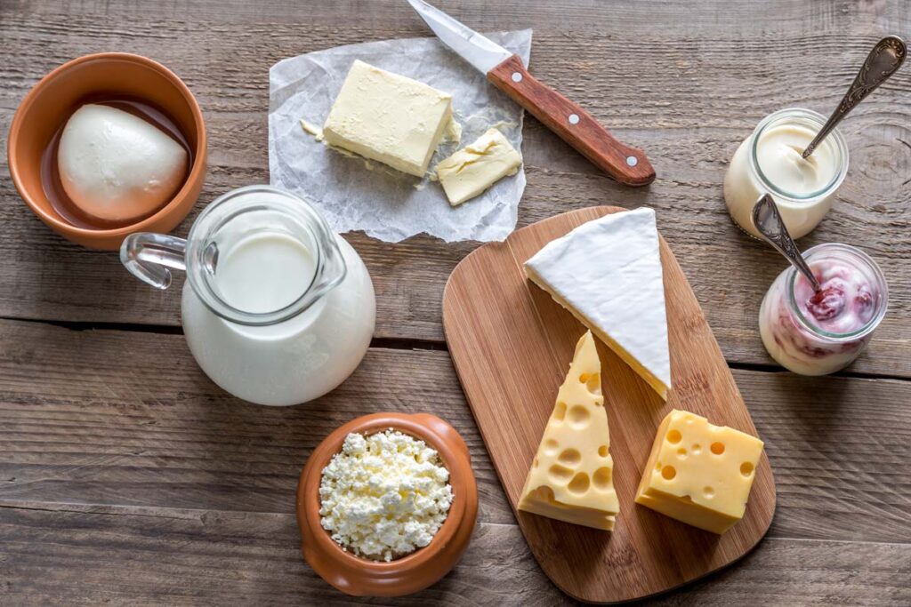 Top view of various dairy products on a table, representing the Rio-Lopez dairy recall.