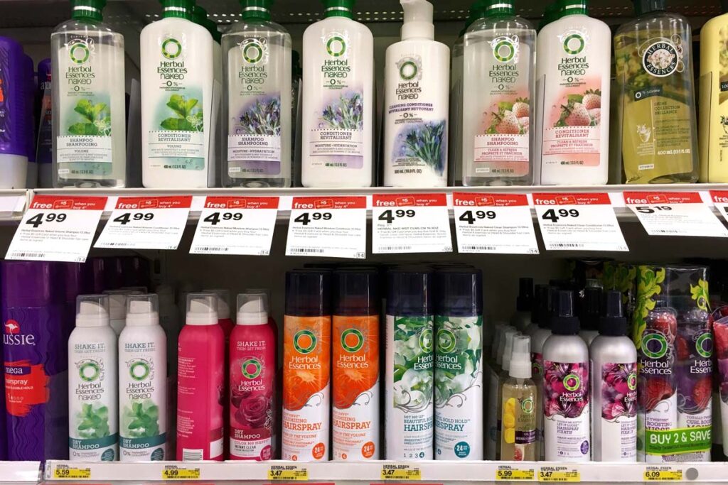 Herbal Essences products on a supermarket shelf, representing the Herbal Essences and Pantene class action over allegedly falsely advertised naturally derived ingredients.