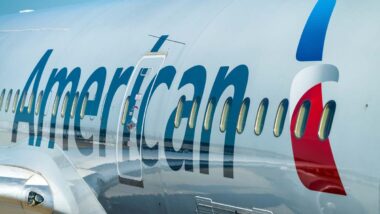 Close up of American Airlines logo on the side of a plane, representing the American Airlines class action.