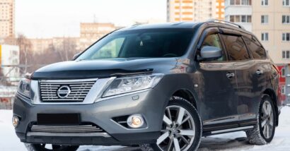 A gray 2015 Nissan Pathfinder, representing the Nissan class action.