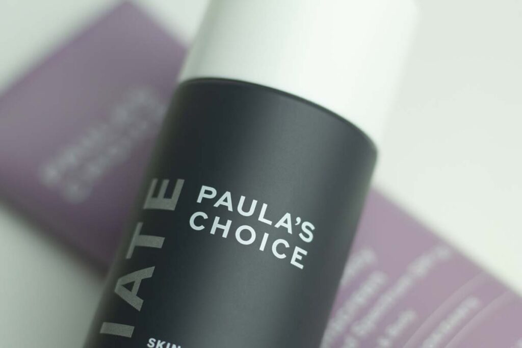 Close up of Paulas Choice logo on a skincare product, representing the Paula's Choice class action.