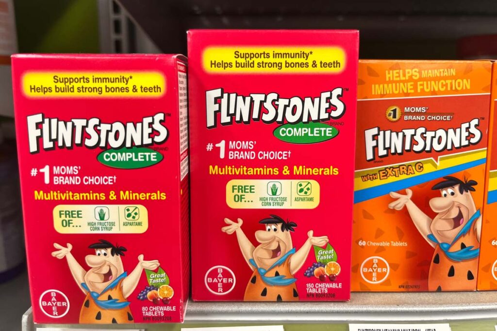 Close up of Flintstones Vitamins on a supermarket shelf, representing the Flintstones vitamins class action.