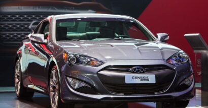 A silver Hyundai Genesis on display at a car show, representing the Hyundai class action.