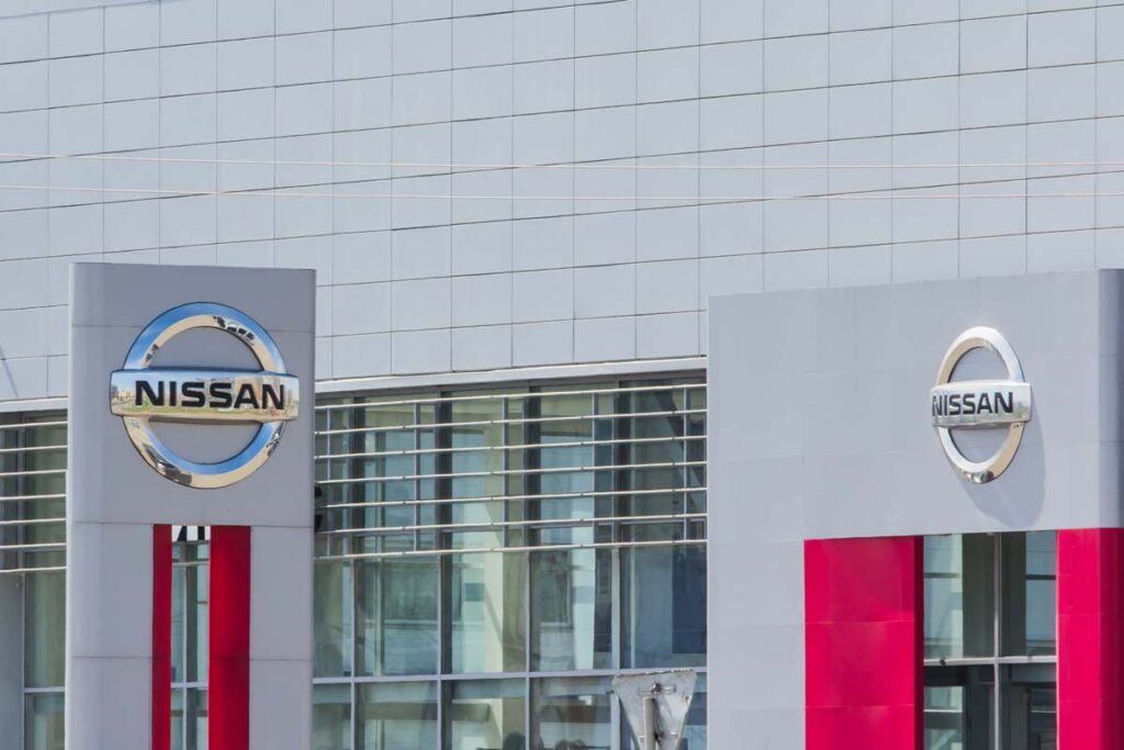 Exterior of a Nissan dealership, representing Nissan settlements.