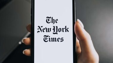 Close up of the New York Times logo displayed on a smartphone screen, representing New York Times subscriber class action.