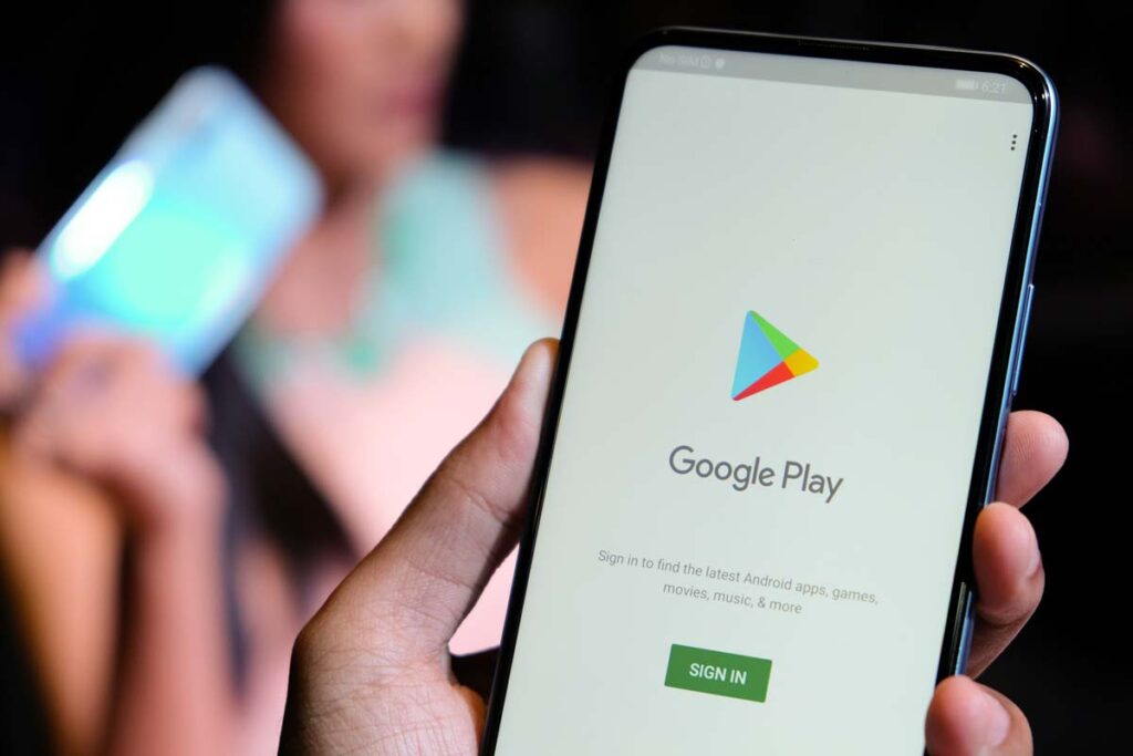 Google Play Store login page displayed on a smartphone screen, representing Google Playstore class action lawsuit.