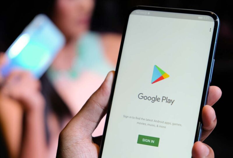 Google Play Store login page displayed on a smartphone screen, representing Google Playstore class action lawsuit.
