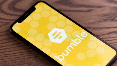 Close up of Bumble logo displayed on a smartphone screen, representing the Bumble discrimination class action.