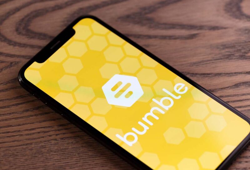 Close up of Bumble logo displayed on a smartphone screen, representing the Bumble discrimination class action.