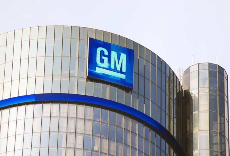 Exterior of General Motors headquarters, representing GM class actions and recalls.