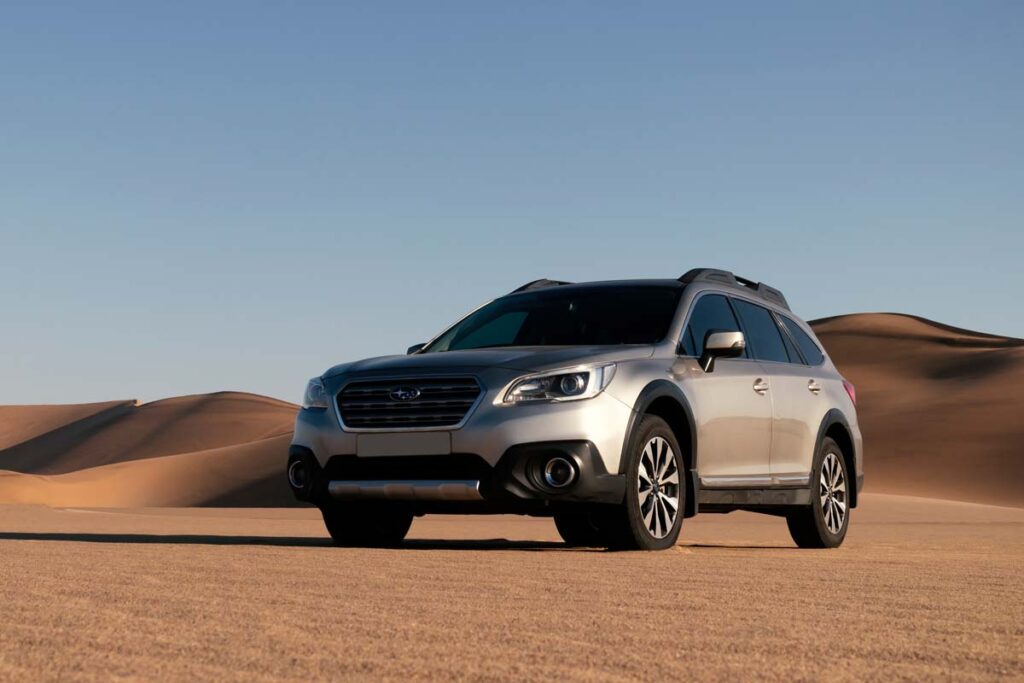 A Subaru Outback in a desert, representing the settlement over allegedly defective Subaru windshields.