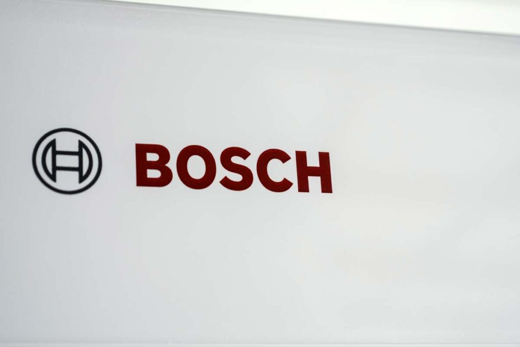 Close up of Bosch logo on an appliance, representing the Bosch defective VFD control panels settlement.