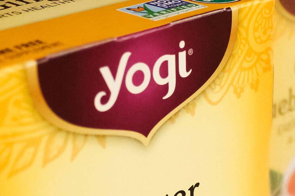 Close up of Yogi logo on a tea packaging box, Yogi tea bags recall, representing the Yogi tea bags recall.